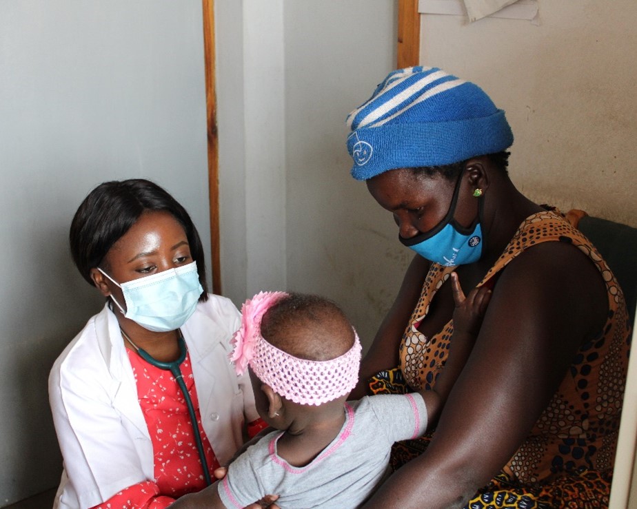 A doctor cares for a baby