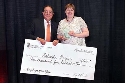 Employee of Year Donates Prize to CURE Scholars Smaller