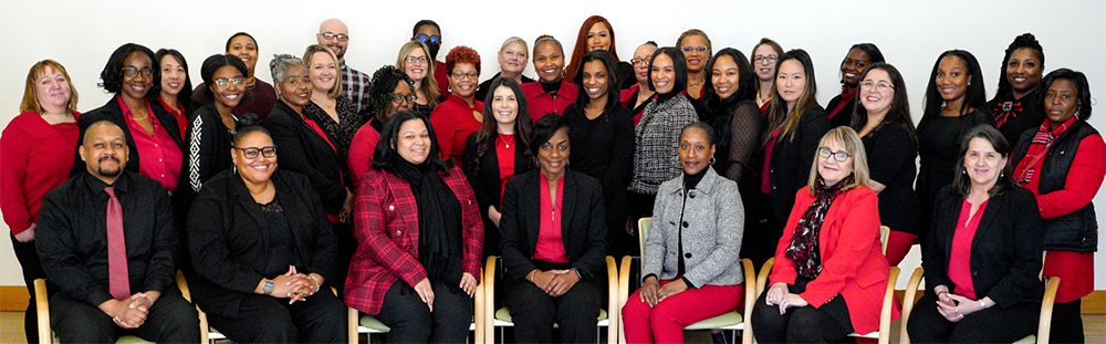 Formal group photo of the full staff of UMB's Human Resources department