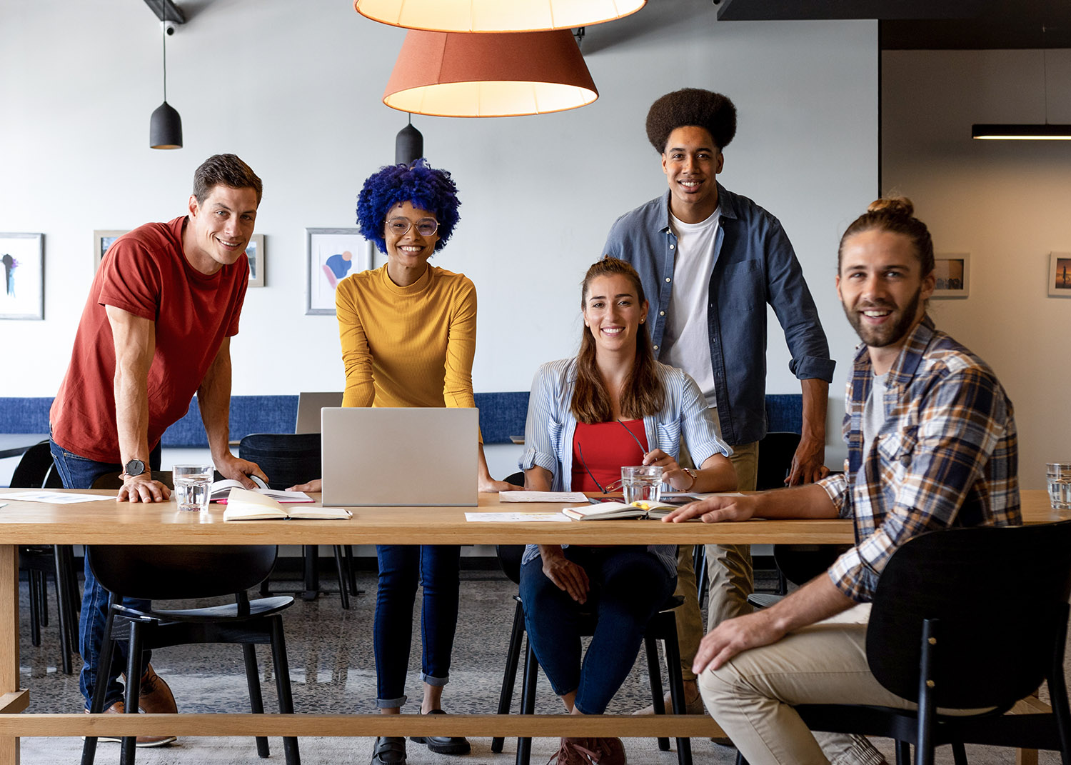 group of professionals meeting around a conference table