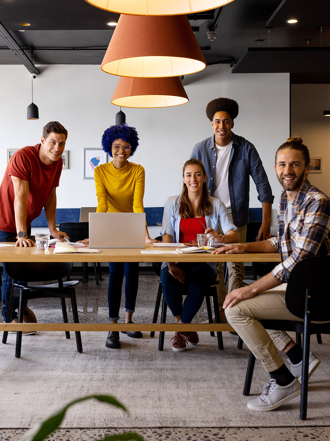 groups of professionals around a common area table