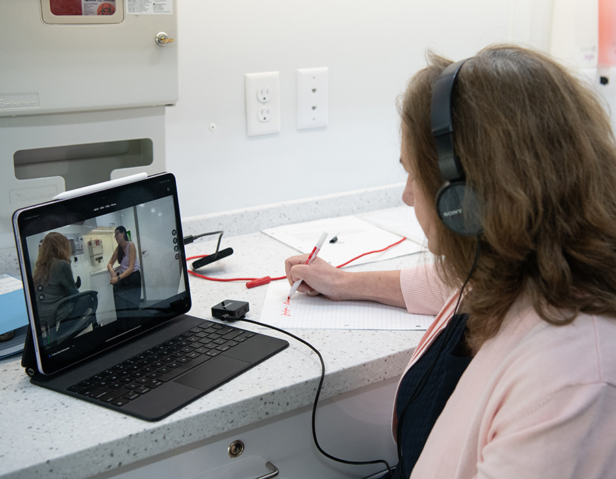 MARCH Faculty observes fellows during patient case simulations.