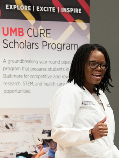 Tonya Webb, PhD, senior associate professor, Department of Microbiology and Immunology, University of Maryland School of Medicine (UMSOM), shares encouraging remarks to the CURE Scholars and their families.