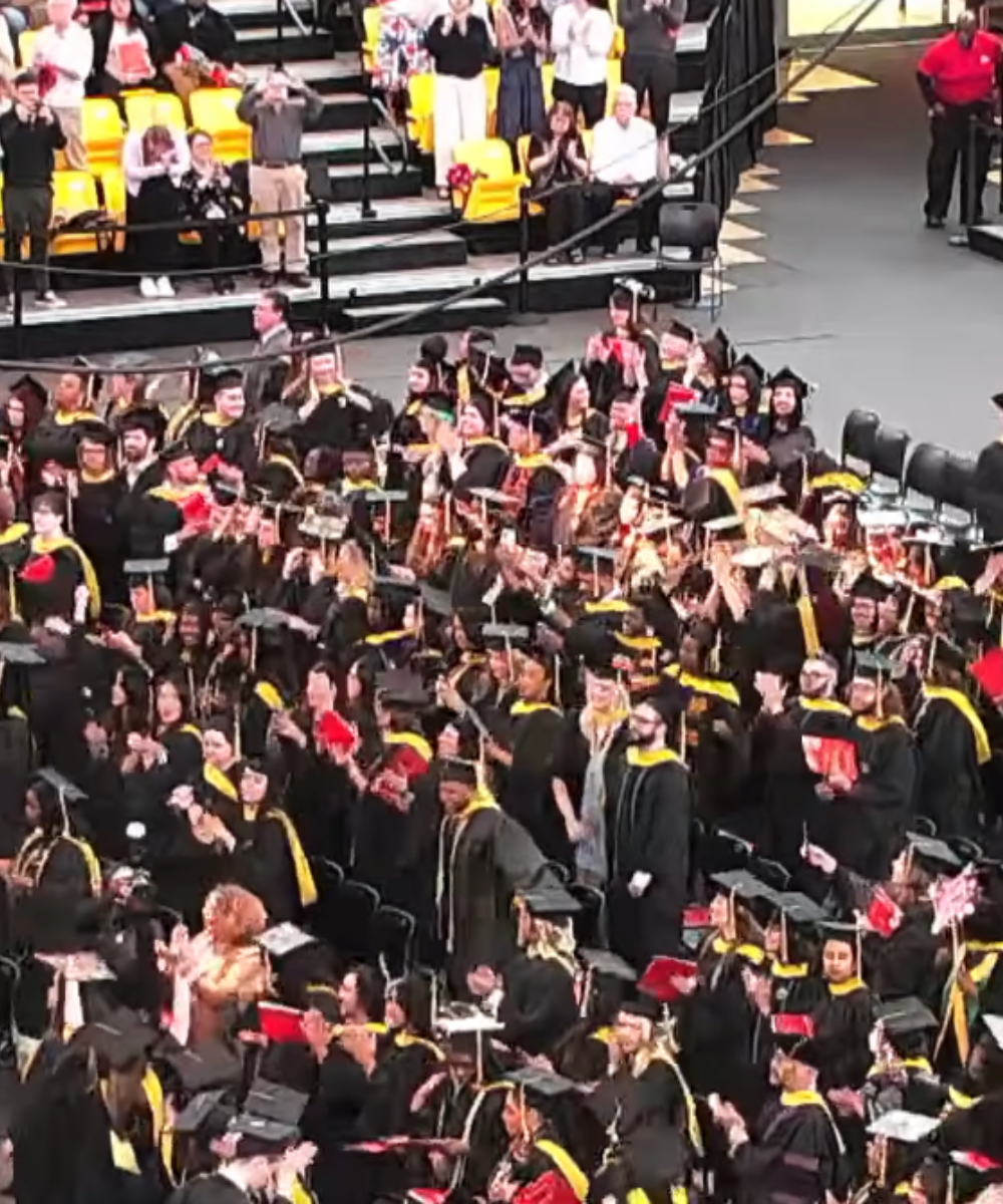University of Maryland School of Social Work gradautes of the Class of 2026 celebrate at the conclusion of its convocation ceremony on May 15, 2026, at SECU Arena.