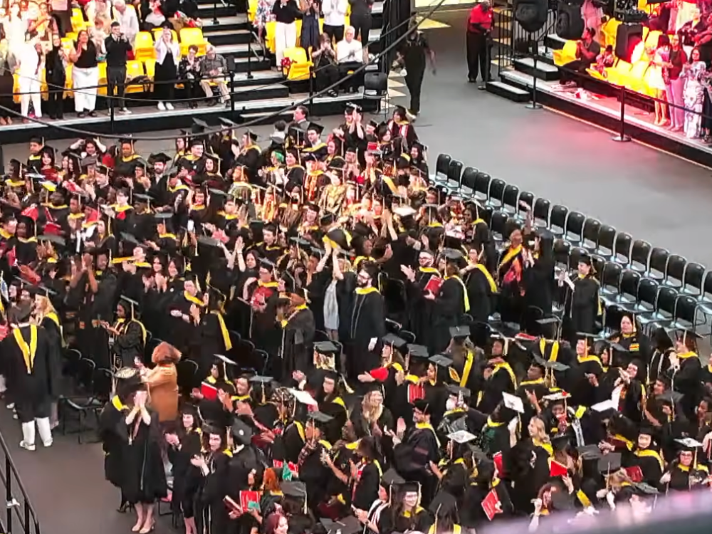 University of Maryland School of Social Work gradautes of the Class of 2026 celebrate at the conclusion of its convocation ceremony on May 15, 2026, at SECU Arena.