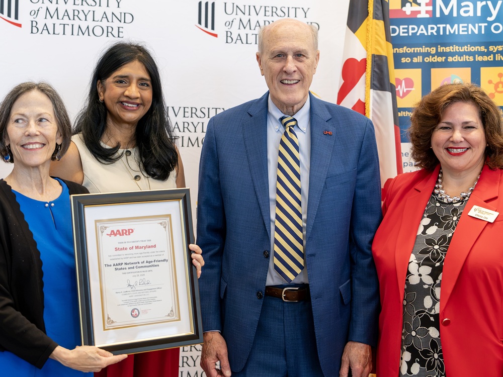 From left: Carmel Roques, secretary, Maryland Department of Aging; Aruna Miller, lieutenant governor of Maryland; Bruce E. Jarrell, president, University of Maryland, Baltimore; and Ofelia Ross Ott, director, Howard County Office on Aging and Independence, during the Age-Friendly Maryland ceremony.