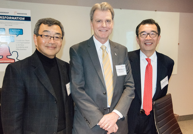 Left to right, James F. Chen, MS, chairman, chief executive officer, and founder of DrFirst; Mark A. Reynolds, DDS, PhD, MA, dean and professor of the UM School of Dentistry (UMSOD); and Charles Chen, DDS, a member of the UMSOD Dean's Faculty. 