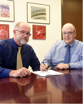 Gary Fiskum, PhD, and Robert E. Rosenthal, MD