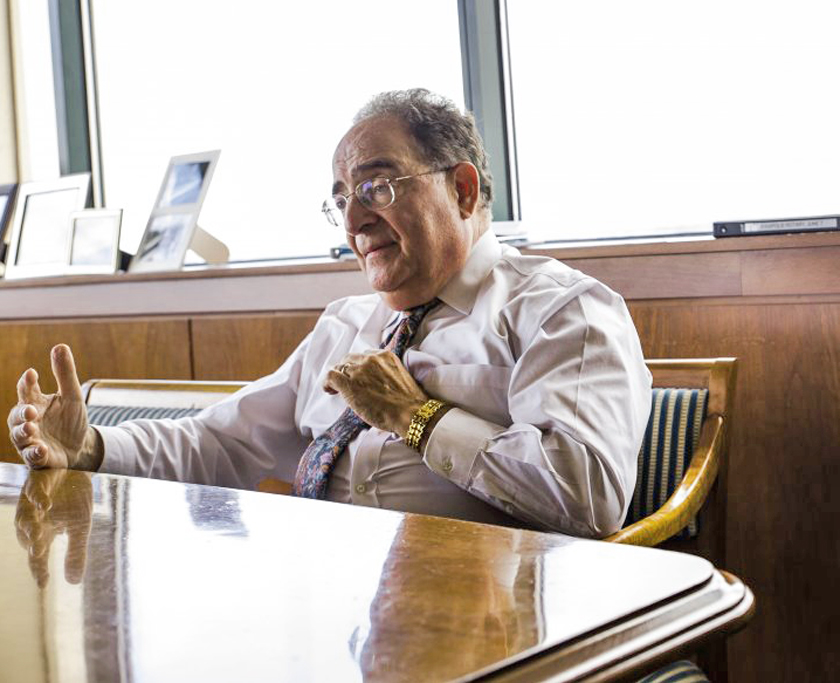 UMB President Jay A. Perman, MD, is shown in his office in this and a cover photograph by Justin Tsucalas to illustrate the article “A Class of Their Own” in the July 2018 issue of “Jmore” magazine. 