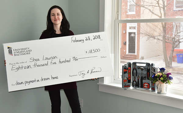 New homeowner Shea Lawson at home in her Pigtown rowhouse