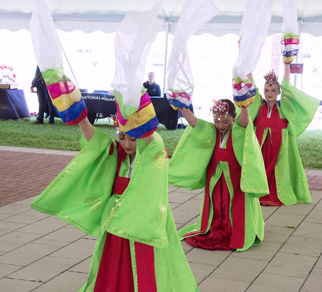 Members of the Hee Kyung Lee Korean Traditional Dance Team perform at the 2019 Neighborhood Spring Festival.