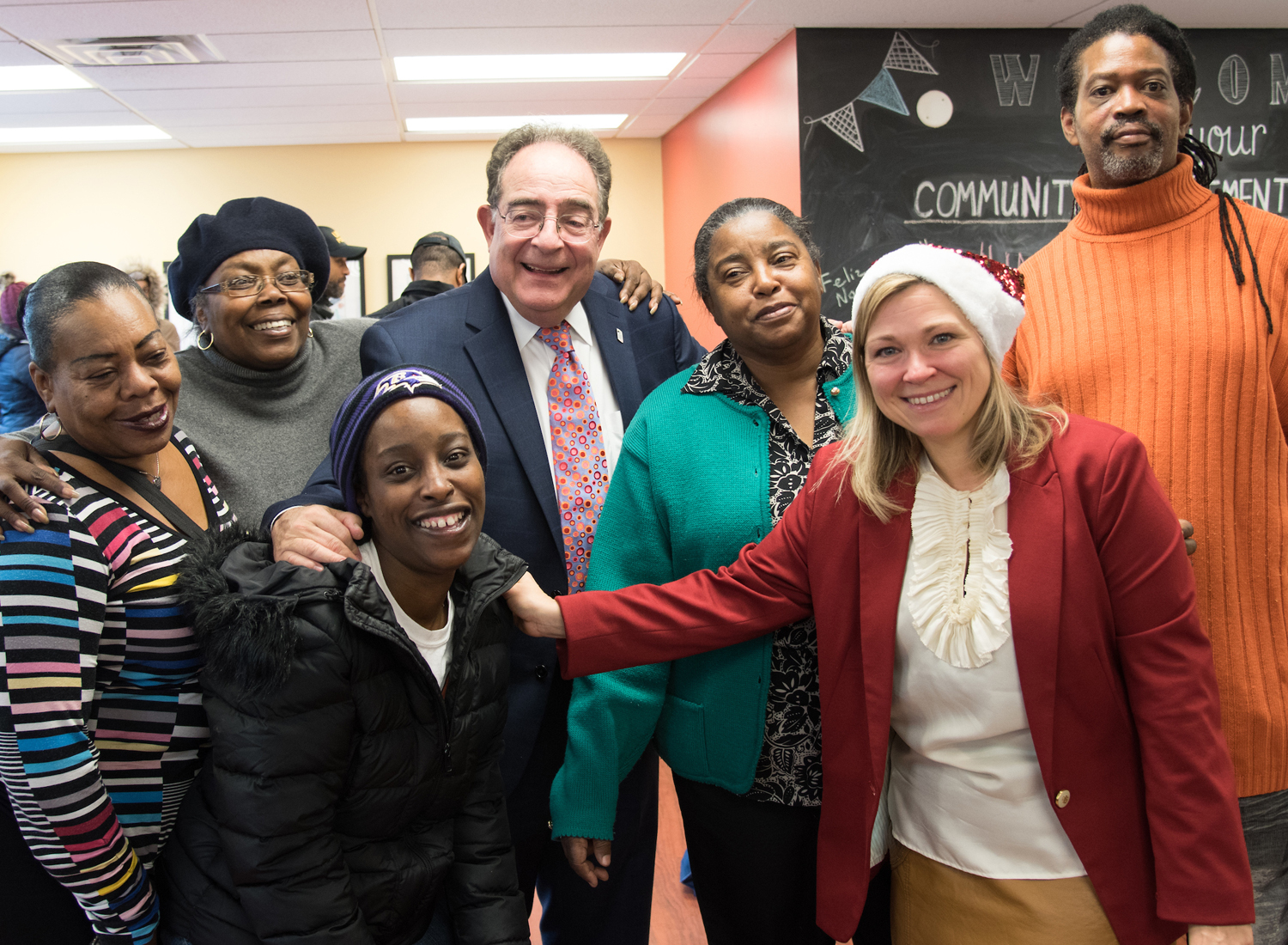 Community Engagement Center Advisory Board members, l-to-r, Cassandra Fair, Dotie Page, Sharina Thompson, Annie Coples, and Leslie Ware with President Jay Perman, MD, center, and Ashley Valis, MSW, executive director of strategic initiatives and community engagement, right foreground.