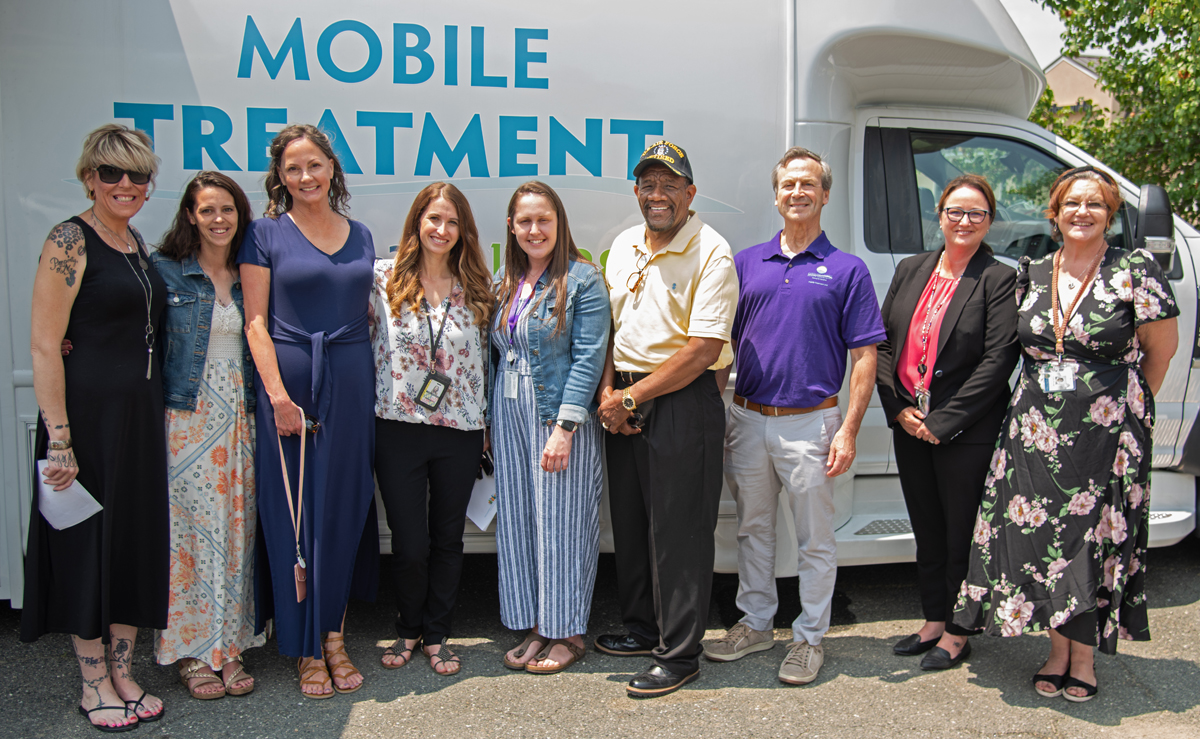 The MTU team (l-r) Jessica Anthony, outpatient program graduate; Brittney Marshall, outpatient program graduate; Linda Tetrick, MSN, RN; Jessica Tuel, MSW, Director of Behavioral Health; Kristina Pullen, Substance Use Counselor; Roger McKnight, MTU Program Administrator; Eric Weintraub, MD; Robin Cahall, Caroline County Health Officer; Carla Penny, MTU Coordinator