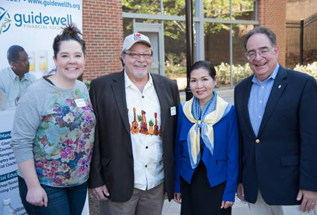Guidewell Director of Business Development Devon Hyde, MSW, left, of the SSW's Financial Social Work Initiative; Guidewell Financial Director of Housing Tom Simonton; Maryland's First Lady Yumi Hogan; and UMB President Jay A. Perman, MD, at the Community Engagement Center grand opening.