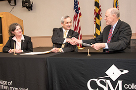 UMSON and CSM officials sign agreement.