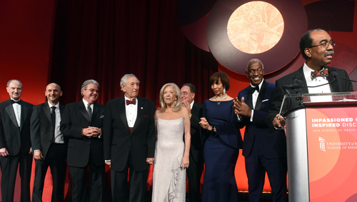 Robert and Susan Fischell are honored by Dean Reece and other dignitaries at the 2018 School of Medicine Gala.