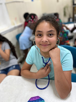 Young Girl Participates in Mini-Med School