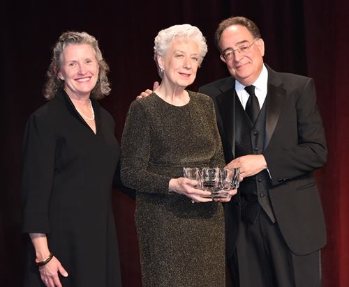 Louise Jenkins receives the Teacher of the Year award with Dr. Perman and School of Nursing Dean Jane Kirschling.