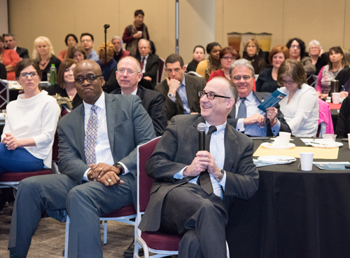 USM Chancellor Robert Caret, VP and Chief Accountability Ofcr. Roger Ward, and others share an amusing moment as Carey Law Dean Donald Tobin asks a question.