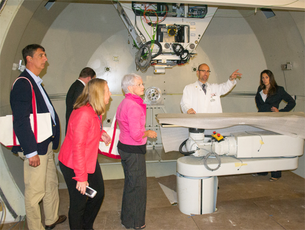 Dr. William Regine gives visiting Maryland legislators an inside look at the Maryland Proton Treatment Center prior to the grand opening.