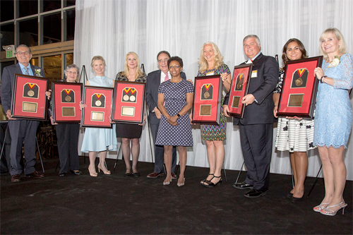 Founding Pharmapreneurs or their representatives pose with Dean Eddington and UMB President Jay Perman.