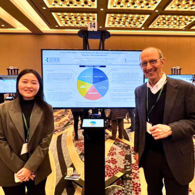 Haelim Lee and Geoffrey Greif at the poster presentation for the study on experiences of Asian Americans who intermarry in the United States.
