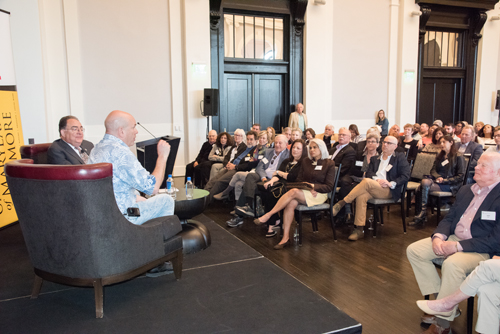 Writer/producer David Simon on stage with UMB President Jay A. Perman, MD, at the Sagamore Pendry Hotel.