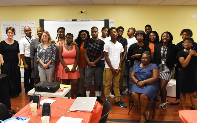 Students who completed YouthWorks jobs July 28 at the Community Engagement Center (CEC) with co-managers Elizabeth Weber of Southwest Partnership and Bill Joyner of the CEC, far left;  program supervisor and SSW student Ruth Farfel, fourth from left; and community supervisors Dozetta Lewis, third from left; Sonia Eaddy, fifth from left, Dotie Page, seated, and Chanté Bonner, third from right. 