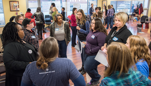 Participants in a nonviolent active bystander training session held on Jan. 20, take turns role-playing scenarios in which they de-escalate conflict and peacefully intervene when witnessing incidents of harassment or abuse.