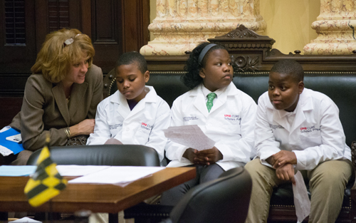 (l-r) Robin Saunders, EdD, MS, Executive Director, UMB CURE Scholars Program, Davioin Hill, Nya Goins, Shakeer Franklin