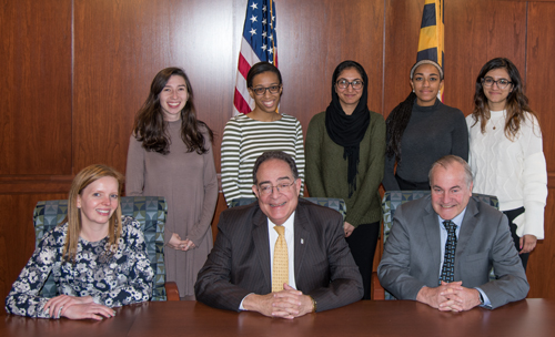 Dr. Perman and grantees (clockwise, from left) Emily Heil, Kim Graninger, Chelsea McFadden, Salam Syed, Taylor Lilley, Rhiya Dave, and Robert Percival.