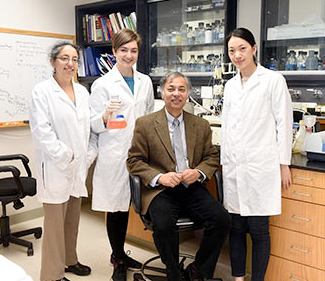 Shiladitya DasSarma, PhD, seated, with research colleagues.