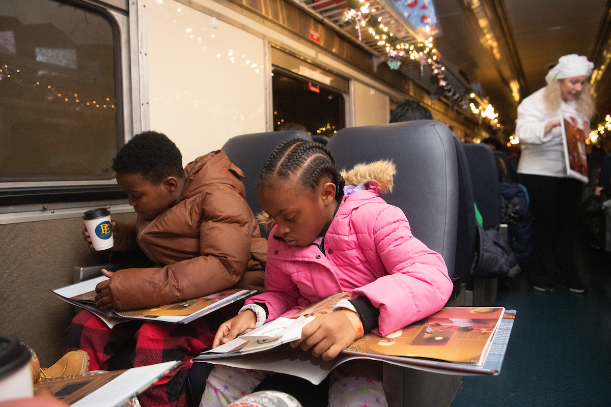 Families on the Polar Express sipped hot chocolate and followed along with the book as the story played on the speakers.