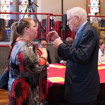 Abree Johnson, a coordinator in the Shock, Trauma and Anesthesiology Research organized research center, chats with Kirwan at the Core Values Speakers Series presentation. 