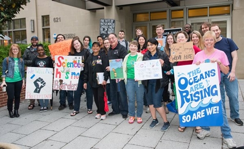 UMB President Jay A. Perman, MD, with students and faculty gathered to travel to Washington, D.C. for the March for Science.