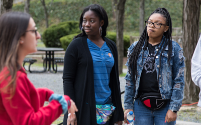 Ninth grade CURE Scholars, Ayishat Yussuf (left) and Markia Eubanks (right), take a tour of the UMCP campus.