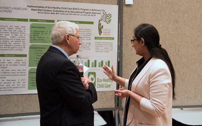 MPH candidate Mehren Mehtab explains her research at Public Health Reseach Day at Maryland 2019.