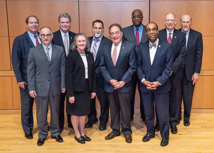 Front row, from left: Donald B. Tobin; Jane M. Kirschling; Jay A. Perman; and E. Albert Reece. Back row, from left: Thomas J. Sullivan; Mark A. Reynolds; Richard P. Barth; Roger J. Ward; Peter J. Murray; and Bruce Jarrell.