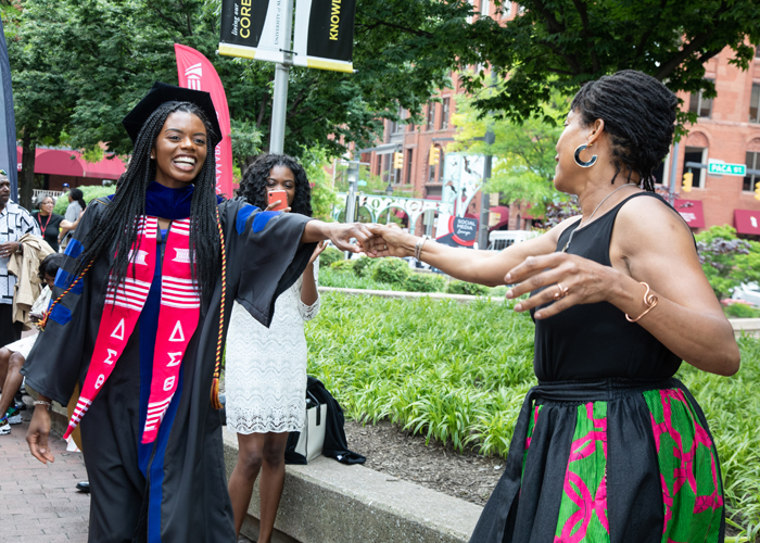 The 2019 graduates of the University of Maryland, Baltimore celebrate their academic accomplishments with food, fun, and dancing at Party in the Park.