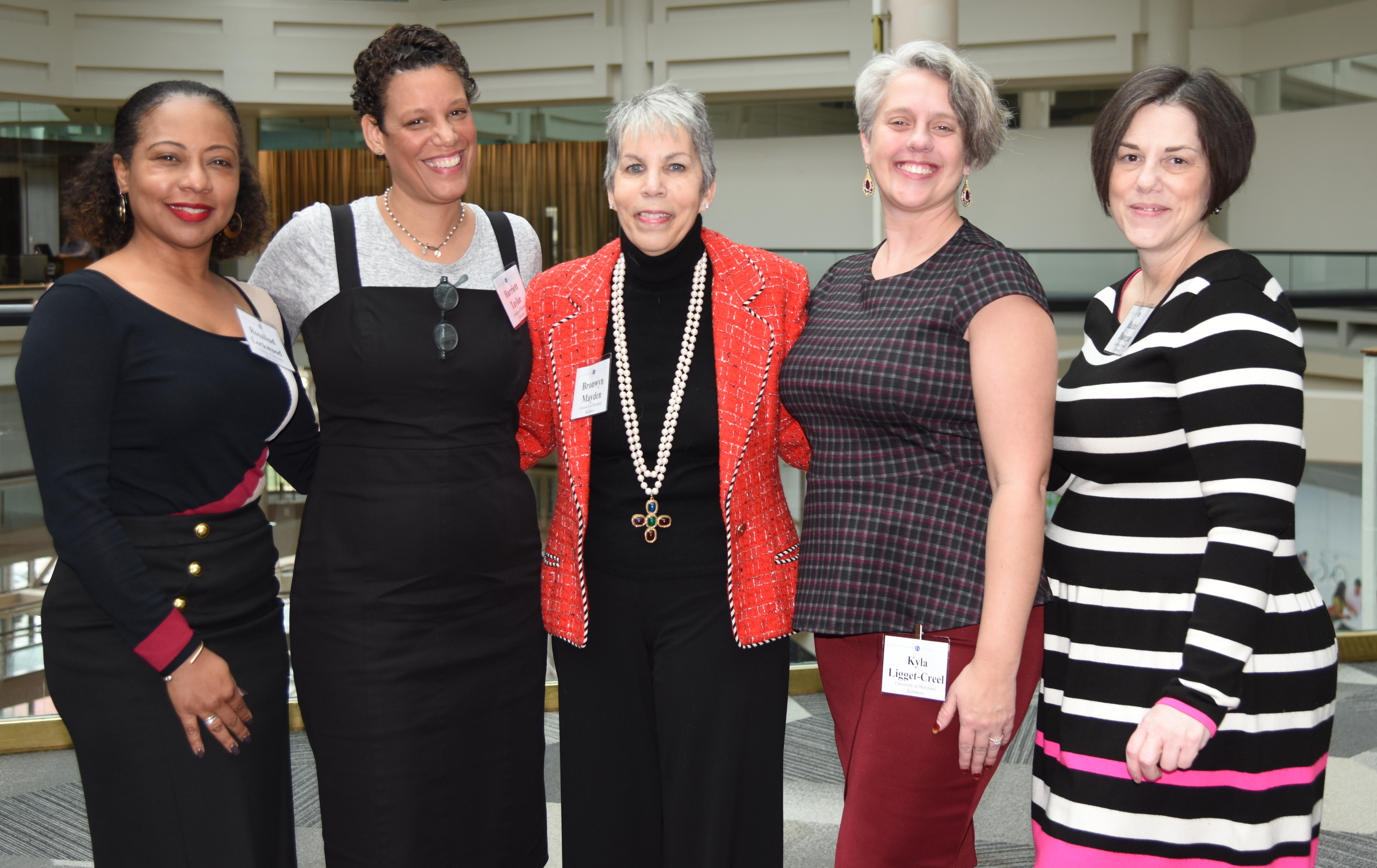 From left, Rosalind Lockwood, executive director, Furman L. Templeton Preparatory Academy; Henriette Taylor, director of partnerships, Promise Heights; Brownyn Mayden, executive director, Promise Heights; Kyla Liggett-Creel, director of research and evaluation, Promise Heights; and Rachel Donegan, assistant director, Promise Heights.
