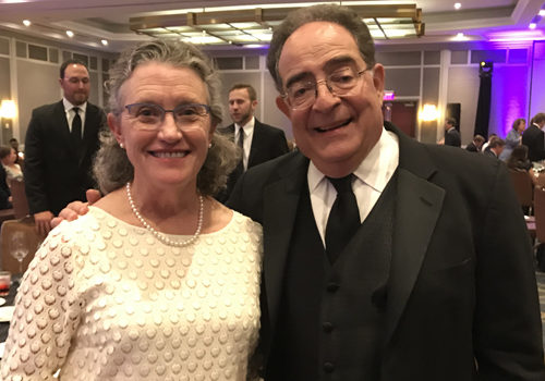 University of Maryland School of Nursing Dean Jane M. Kirschling, PhD, RN, FAAN, and University of Maryland, Baltimore President Jay A. Perman, MD, pose for a picture April 14 at the Paul's Place 35th Annual Gala, where Perman was awarded the Commitment to Community Award.