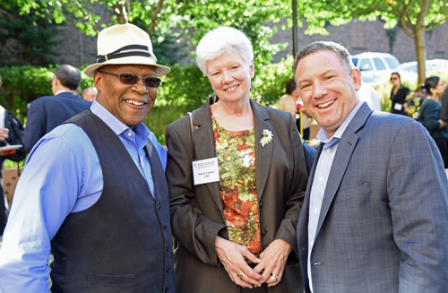 The 2017 UMB-UMCP Seed Grant recipients celebrate a year of research at the UMB-UMCP Seed Grant Symposium with (bottom row, from left) UMCP President Wallace Loh, PhD, JD; Vice President of Research for UMD Laurie Locascio, PhD; UMB President Jay A. Perman, MD; and UMB Executive Vice President, Provost, and Graduate School Dean Bruce Jarrell, MD, FACS.