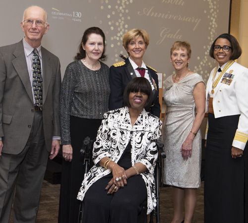The newest University of Maryland School of Nursing Visionary Pioneers gather for a photo during the 130th annual anniversary gala. From left are Arthur J. Milholland, MD, the brother of Kathleen Milholland Hunter, who was accepting the award on her family’s behalf; Mary Etta C. Mills; Margaret Chamberlain Wilmoth; Robin Newhouse; Rear Adm. Sylvia Trent-Adams; and Bertha L. Davis (sitting).