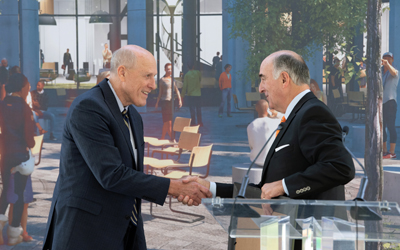 Bruce E. Jarrell, MD, FACS, UMB president (left) accepts a citation from Maryland Commerce Secretary Mike Gill. 