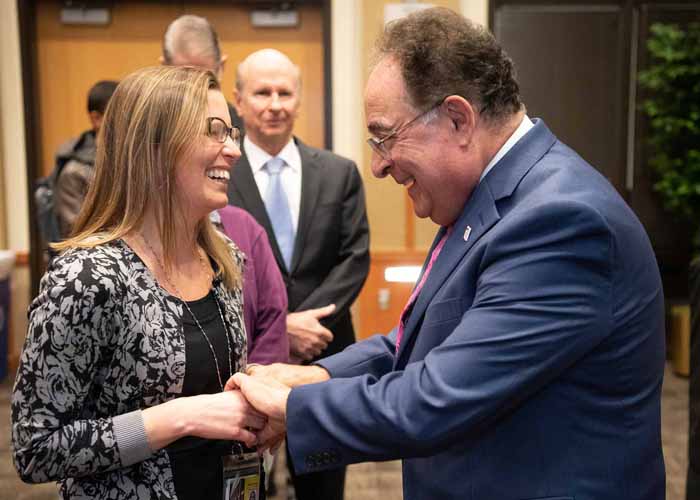 Dr. Perman greeted a line of well-wishers before and after the celebration on Dec. 12 at the SMC Campus Center.