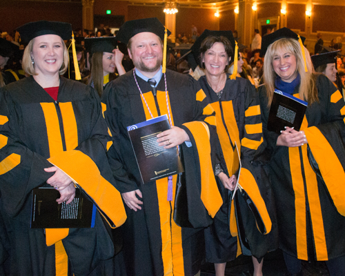 DNP graduates Jennifer Fitzgerald, Timothy Meyenburg, Karen Miga, Susan Phelps