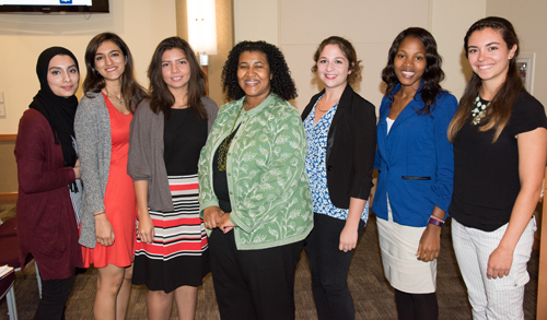 (l-r) Saniya Chaudhry, Rhiya Dave, Elizabeth Sibrian, Dawn Whitehead, Alexandra Huss, Esther Kimani, and Molly Crothers. Not pictured are Nana Akua Tufuoh, Wesley Chan, and Sheridan Todd Yeary.