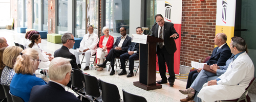 University of Maryland, Baltimore President Jay A. Perman, MD, addresses University and state health officials gathered for a news conference announcing a new residency program aimed at bringing primary care physicians to the Eastern Shore of Maryland.