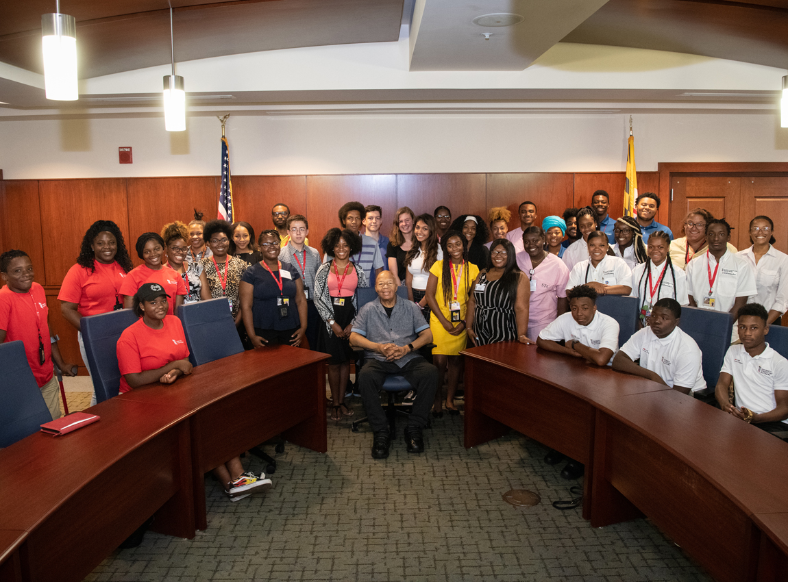 U.S. Representative Elijah E. Cummings visits with UMB YouthWorks interns.