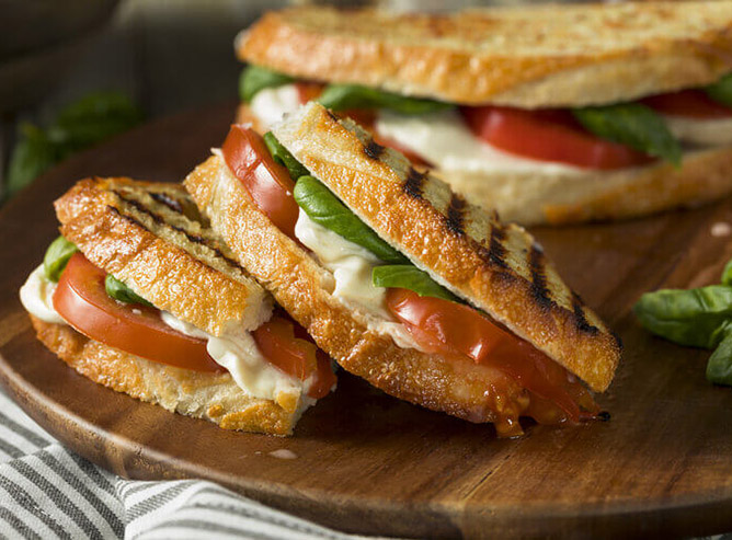 A plate of paninis.